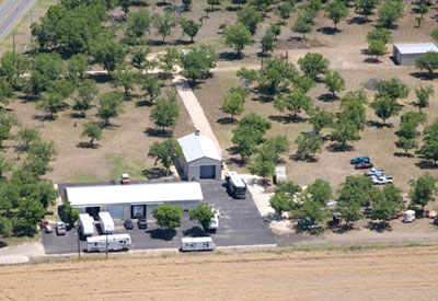 Aerial view of McQueeney Collision Inc. on 31 acres nested in the Texas Hill Country